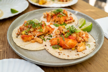 Fototapeta na wymiar Lobster Tacos on a gray plate in a 3 combo