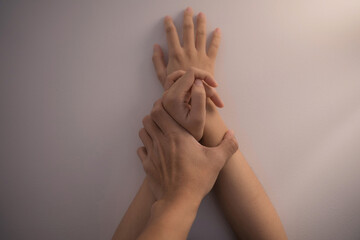 Hands couple having sex Close to the wall