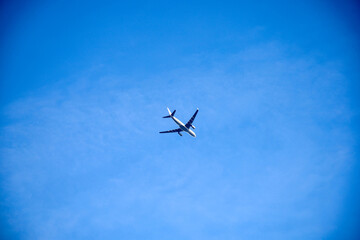 Airplane in the blue sky