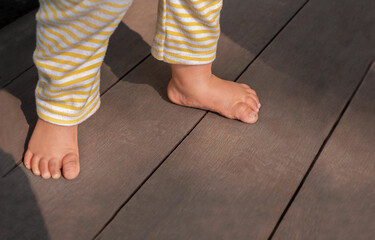 Baby's feet are taking their first steps.