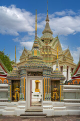 Fototapeta premium Beautiful famous giants infront of Wat Pho temple gate Thai art architecture famous place and travel attraction at Bangkok, Thailand.