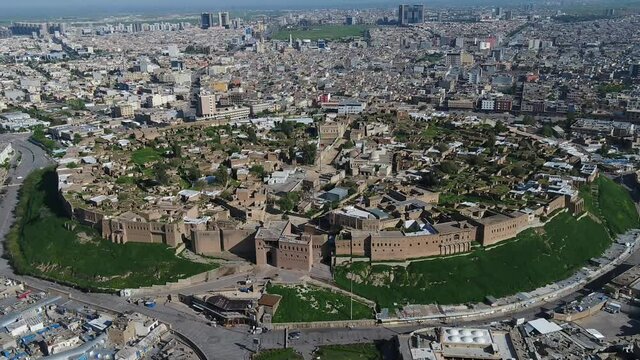 The Erbil Citadel, locally called Qelat (Kurdish: &lrm;Qelay Hewl&ecirc;r; Assyrian: ) is a tell or occupied mound, and the historical city centre of Erbil in the Kurdistan Region of Iraq