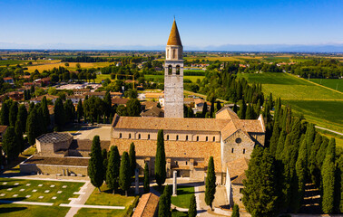 Scenic aerial view of small Italian city of Aquileia and ancient Patriarchal Basilica di Santa...