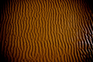 Photo of the ripple texture in the sand at the beach in Lorne on the great ocean road golden hour sunset sunrise