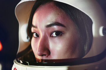 Female astronaut with glass helmet - obrazy, fototapety, plakaty