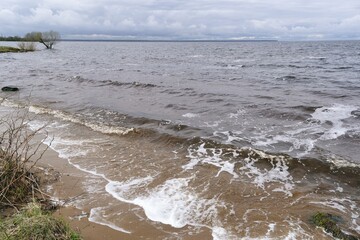Spring flood and the flooded bank of the reservoir.