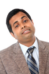 Indian business man portrait with funny expression isolated on white.