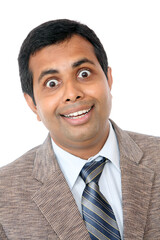 Indian business man portrait with funny expression isolated on white.