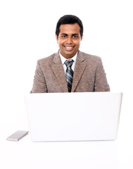 Indian young businessman with laptop isolated on white.