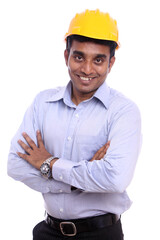 Young Indian architect posing to the camera on white background.