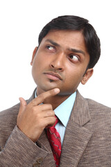 Indian business man portrait with thinking expression.