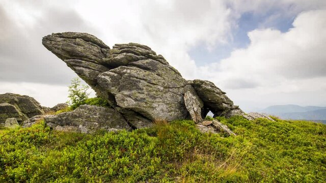 4K Timelapse of moving clouds above turtle stone, Low Tatras, Slovakia