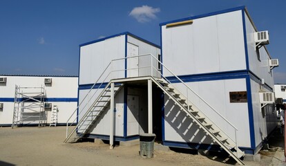 Portacabin, porta cabin, temporary labours camp , Mobile building in industrial site or office container Portable house and office cabins. Labor Camp. Porta cabin. small temporary houses