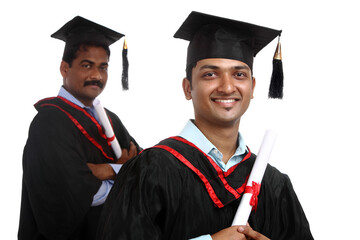 Indian graduates isolated on white.