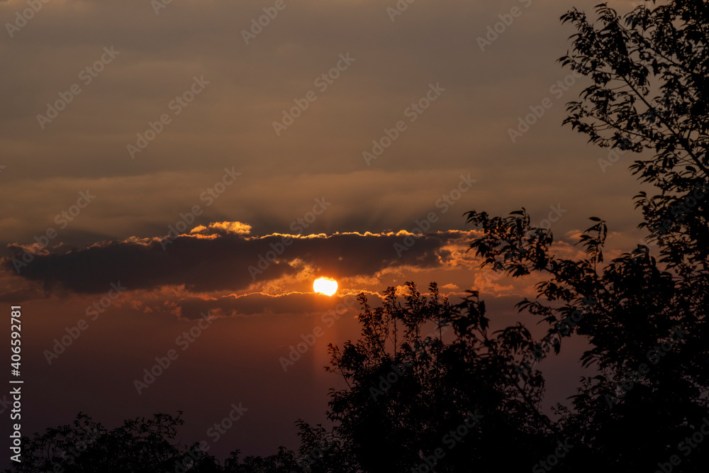 Sticker sunset over the river