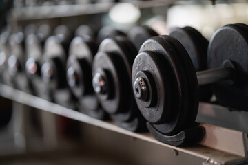 close up of dumbbell in the gym. sport concept