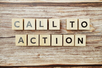 Call to Action alphabet letter on wooden background