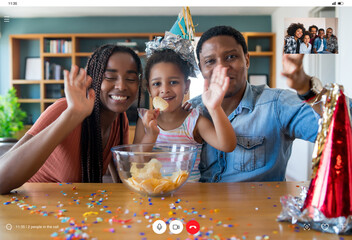 Family celebrating birthday on a video call.