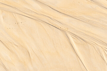 Fine beach sand in the summer sun