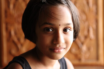 Pretty Indian funny teen girl portrait.