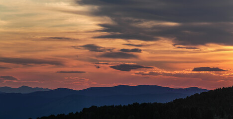 Scenic sunset in the mountains, beautiful clouds