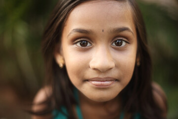 Indian beautiful teen girl posing to camera with smile