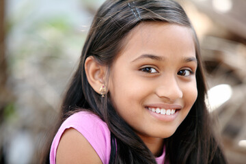 Indian beautiful teen girl posing to camera with smile