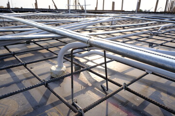 Post tension/Reinforced concrete slab with electrical pipe on it, ready for concrete 