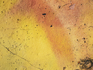 Fragments of a painted wall. Spray-painted wall. Concrete wall texture.