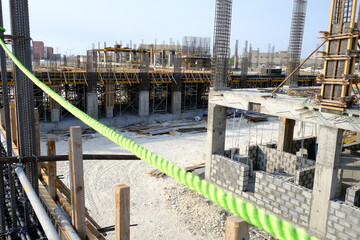 construction site with safety rope on periphery of the slab