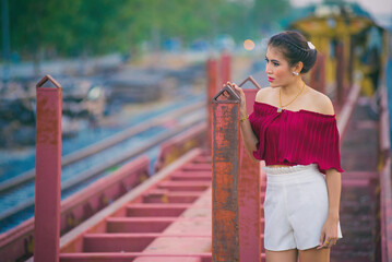 young woman at the old train station.