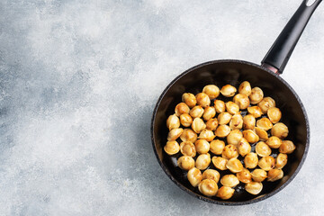 Delicious fried dumplings with meat in a pan. Copy space top view
