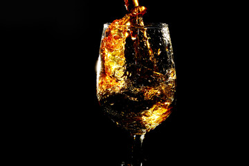 Pouring water into wine glass