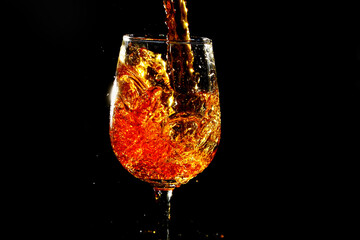 Pouring water into wine glass