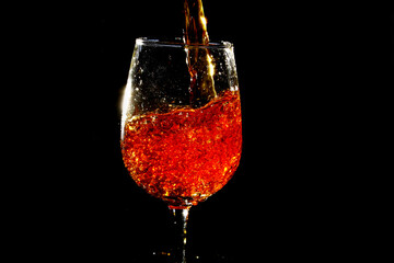Pouring water into wine glass