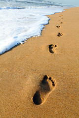 footprints on the beach