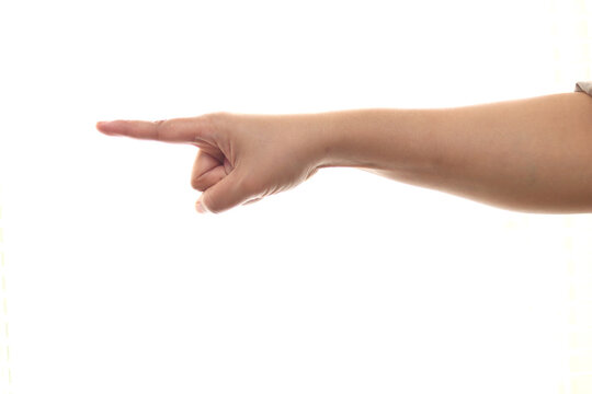 Hand of a person pointing forward, side view, isolated cut out on white