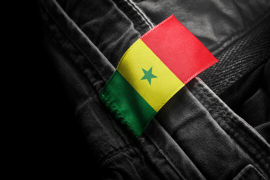 Tag on dark clothing in the form of the flag of the Senegal