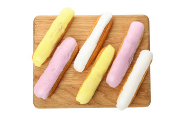 Board with eclairs with custard isolated on white background