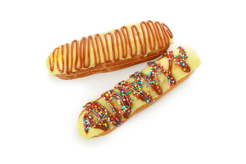 Delicious eclairs with custard isolated on white background
