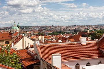 Fototapeta na wymiar Tile roofs of the old city Prague, Czech Republic