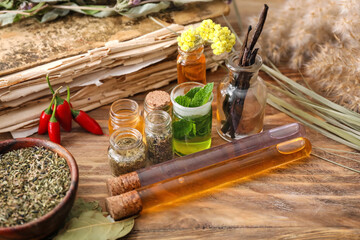 Ingredients for preparing potions on wooden background