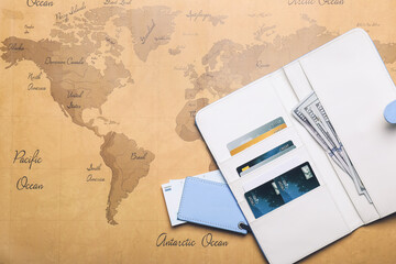 Travel organizer with different things on world map