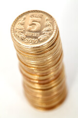 Pile of money ( Indian coin ) on white background