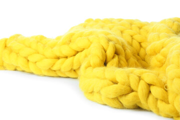 Yellow knitted plaid on white background