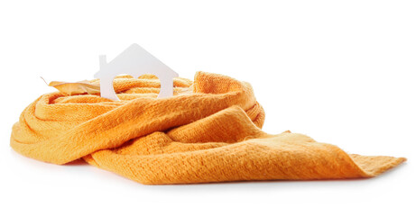Figure of house, autumn leaves and warm scarf on white background. Concept of heating season