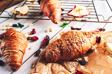 Croissants on white background with nuts
