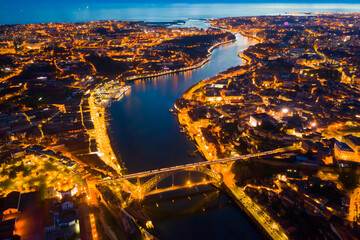 Aerial view illuminated of the Ponte de Dom Luis Bridge at night, Porto, Portugal