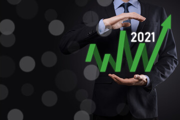 Plan business positive growth in year 2021 concept. Businessman plan and increase of positive indicators in his business, Growing up business concepts.