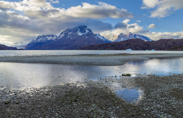 The lake Lago Grey with the Paine mountain range in the background in Patagonia